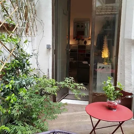 Апартаменты Joli Studio Et Sa Terrasse Proche Montmartre